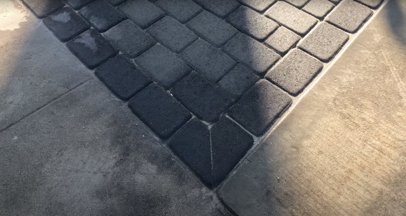 Decorative stamped concrete with paver pattern design